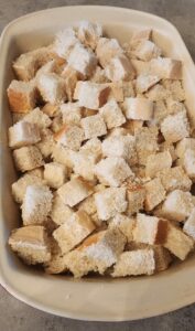 bread pieces in baking dish