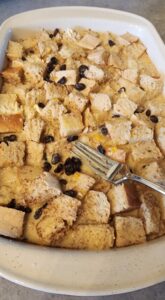 bread pieces and custard mix before baking into bread pudding