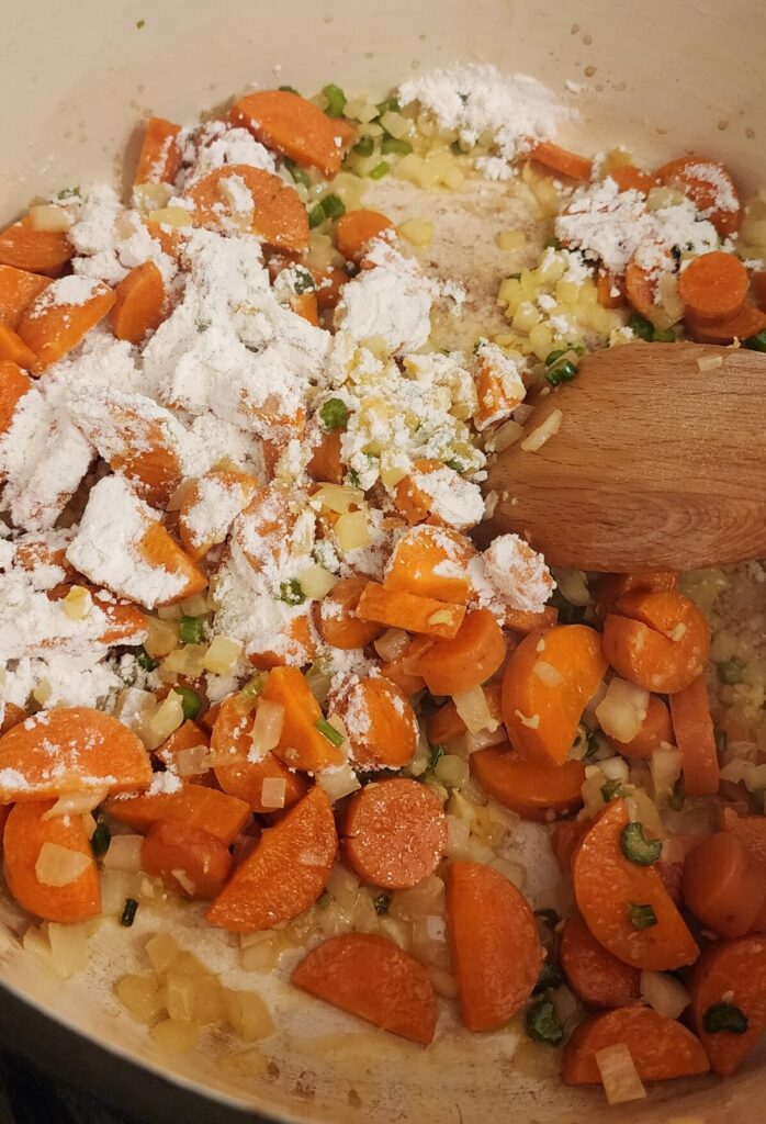 flour on sauteed vegetables