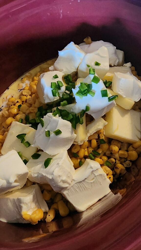slow cooker creamed corn ingredients in a slow cooker