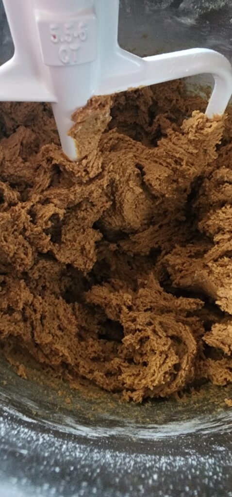 ginger molasses cookie dough in mixer bowl