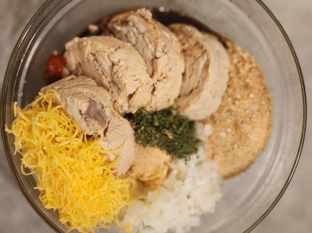 salmon cake ingredients in a mixing bowl